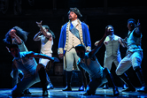 Trevor Dion Nicholas as George Washington and ensemble - Johan Persson